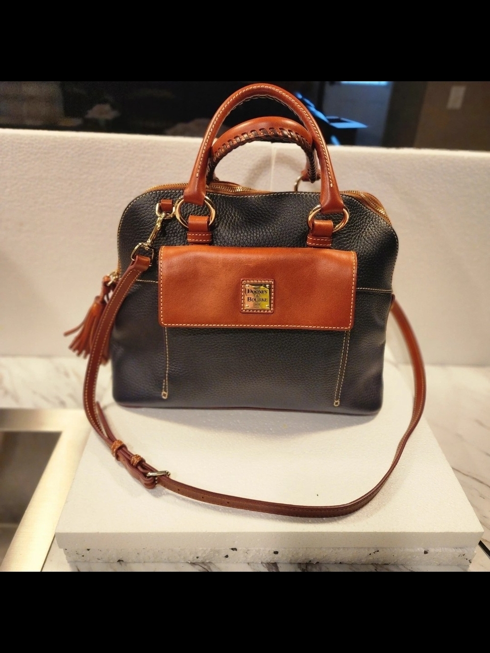 Dooney & Bourke Black Satchel with Brown Trim and Tassel